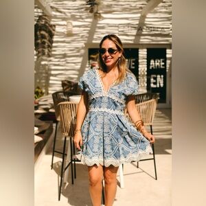 Waimari

Time Cassandra Embroidered  V-Neck Minidress